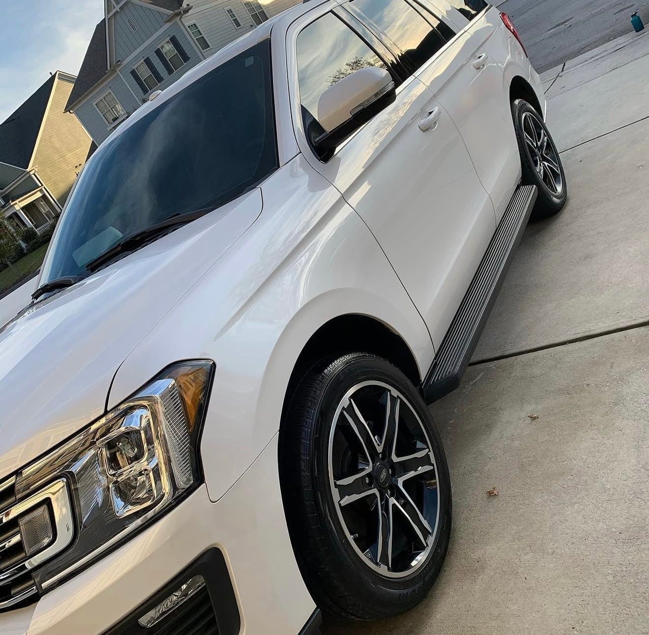 A white Ford Expedition after an exterior detail